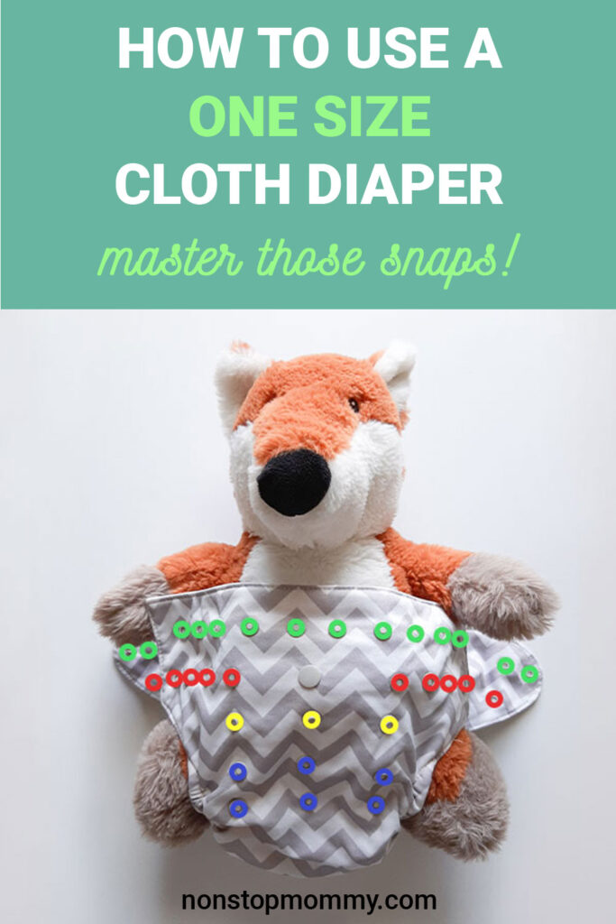 How to Use a One Size Cloth Diaper Master Those Snaps at nonstopmommy.com. The picture is of a one size cloth diaper with color coded snaps.