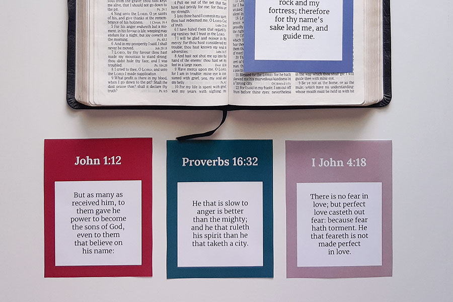 an open KJV Bible and the free KJV Bible verse cards